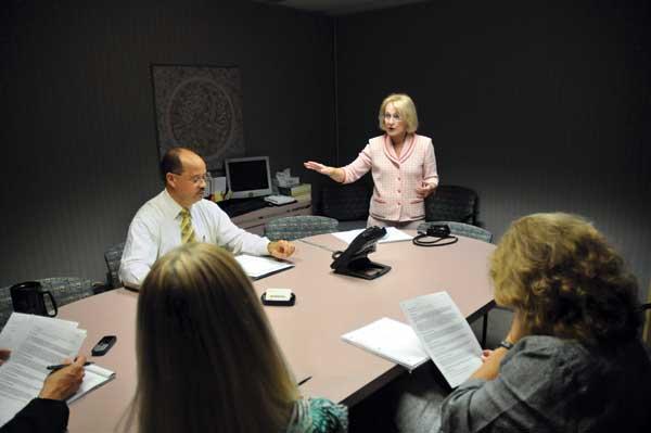 Cheryl Scheiner Conducting a Meeting